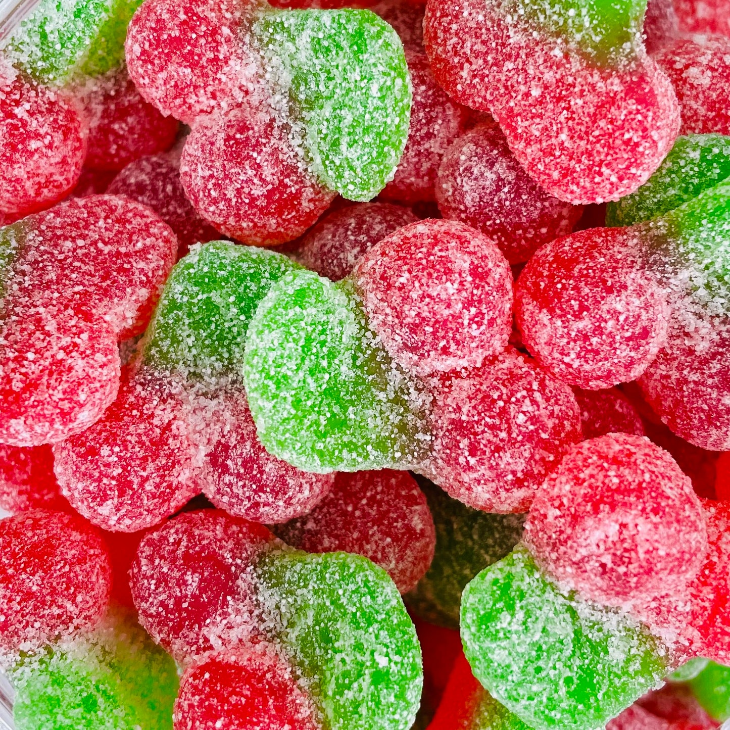 Red and green fizzy cherry sweets