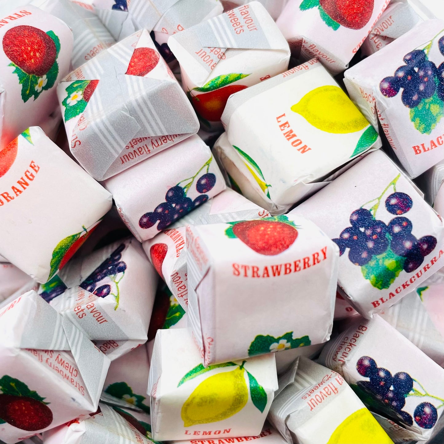 Fruit caramel Sweets individually wrapped with pictures of fruit flavours